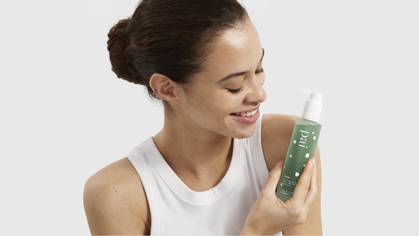 Woman holding Pai Skincare Phaze PHA Clarifying Face Wash